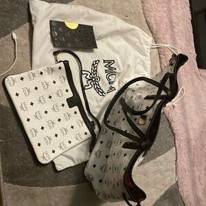 COPY - Authentic MCM leather hand bag with small clutch. There is discoloration